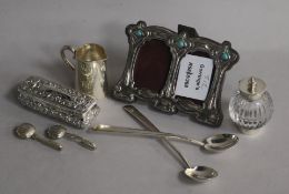 An early 20th century Art Nouveau sterling silver and enamel(a.f.) double photograph frame and other
