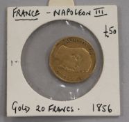 A French Napoleon III 20 Franc gold coin, 1856, sealed inside a card and plastic mount, 6.4g net, F
