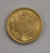 A Saudi Arabian gold one guinea coin, 1950, 7.98g, prooflike