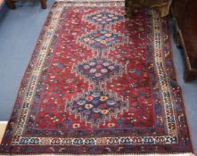 A Persian rug 140 x 200cm