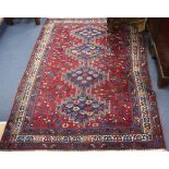 A Persian rug 140 x 200cm
