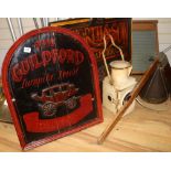 Two painted wood advertising signs, washboard, sieve, starboard lamp and a rudder