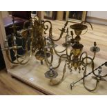 A pair of Dutch style brass chandeliers