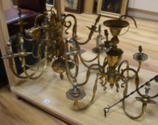 A pair of Dutch style brass chandeliers