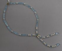 A single strand blue topaz and freshwater pearl tassel drop necklace with 18ct gold clasp, approx