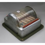 A small chromium plated jukebox 33cm