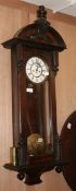 A late 19th century walnut Vienna regulator, weight driven W.45cm