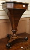 A Victorian rosewood work table base W.36cm