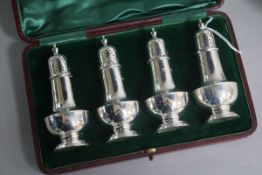 A cased set of four Edwardian silver pepperettes by James Dixon & Sons, Sheffield, 1901, 10.2cm, 5