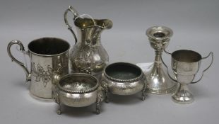 A Victorian engraved silver cream jug, a silver dwarf candlestick and various plated items,
