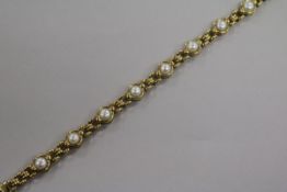 A modern 9ct gold and mabe pearl set bracelet. approx. 18cm.