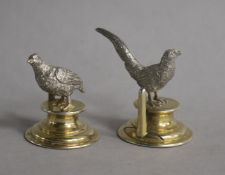 Two Edwardian parcel gilt silver menu holders modelled as a pheasant and a partridge, William