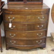 A mahogany bowfronted four drawer chest W.76cm
