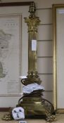 A brass Corinthian column table lamp