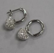 A modern pair of 18ct white gold and diamond set heart shaped drop earrings, with diamond set hoops,