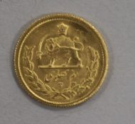 An Iranian Half Pahlavi gold coin, Mohammad Reza Shah 4.06g, GVF