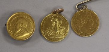 A South African 1/2 Pond gold coin, 1895 and two other items, the 1/2 pond mounted as a brooch,