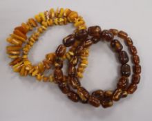 An amber necklace and a simulated amber necklace.