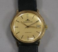 A gentleman's 9ct gold Jaeger le Coultre automatic wrist watch, with case back inscription.