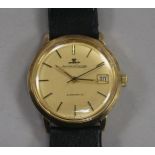 A gentleman's 9ct gold Jaeger le Coultre automatic wrist watch, with case back inscription.