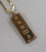 A 1970's 9ct gold ingot pendant, on a 9ct gold box link chain, pendant 40mm.