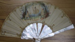 A 19th century silk fan, with mother of pearl sticks, the leaf heightened in gilt and painted with a