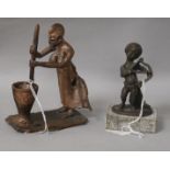 An African wood fired bronze and a bronze cherub