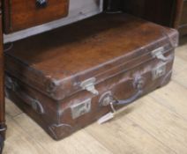 A leather fitted suitcase W.70cm