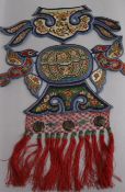 A collection of Chinese embroidered silk panels and appliques