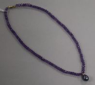 A single strand facetted amethyst bead necklace with Tahitian cultured pearl drop and 9ct gold