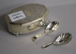 A George V silver trinket box, Birmingham, 1933 and two silver caddy spoons including Victorian.