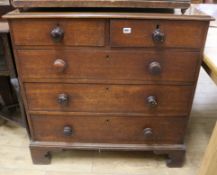 A George III oak chest of drawers W.95cm