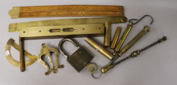 A group of brass tools and instruments