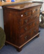 A George II walnut chest of five drawers W.102cm