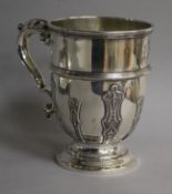 An Edwardian silver mug with strapwork decoration, The Alexander Clark Manufacturing Co, London,