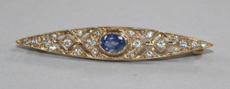 A modern 9ct gold, sapphire and diamond marquise shaped brooch, 51mm.