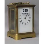 An Edwardian brass carriage timepiece