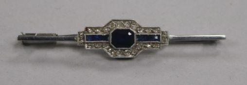 A 1920's/1930's French, platinum, synthetic sapphire and diamond set bar brooch, 54mm.