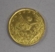 A Turkish 100 Kurush gold coin, 1912, (AH 1327), Sultan Mehmet V (1901-1918), 7.2g
