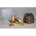 A Kosta Boda vase, a copper jelly mould and a Beswick tiger group (a.f.)