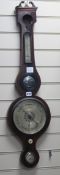 A Regency carved wheel barometer W.27cm