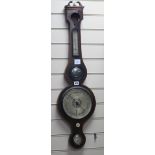 A Regency carved wheel barometer W.27cm