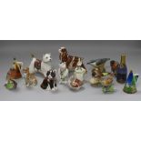 A collection of Royal Worcester birds and snuffers