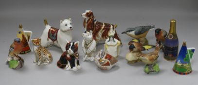 A collection of Royal Worcester birds and snuffers