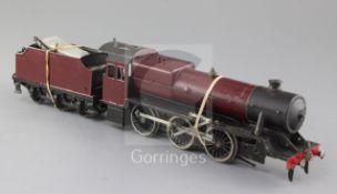 A Bassett-Lowke live steam O gauge 2-6-0 tender locomotive, unmarked crimson livery, (dissembled)