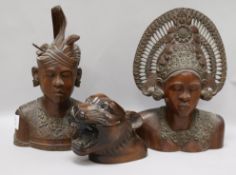 Two Balinese carved hardwood heads and another of the head of a tiger (3) 31cm