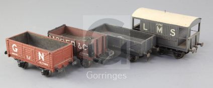 A set of four open wagons, 12 ton, no.149778, in grey, a Moger & Co, no. 785, in brown, a Great
