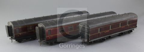 A set of three Exley LMS coaches, no's. 1221 and 8880 and car transporter 30710