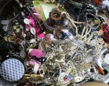 A box of mixed costume jewellery.