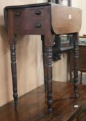 A Regency mahogany work table on ring-turned legs W.47cm